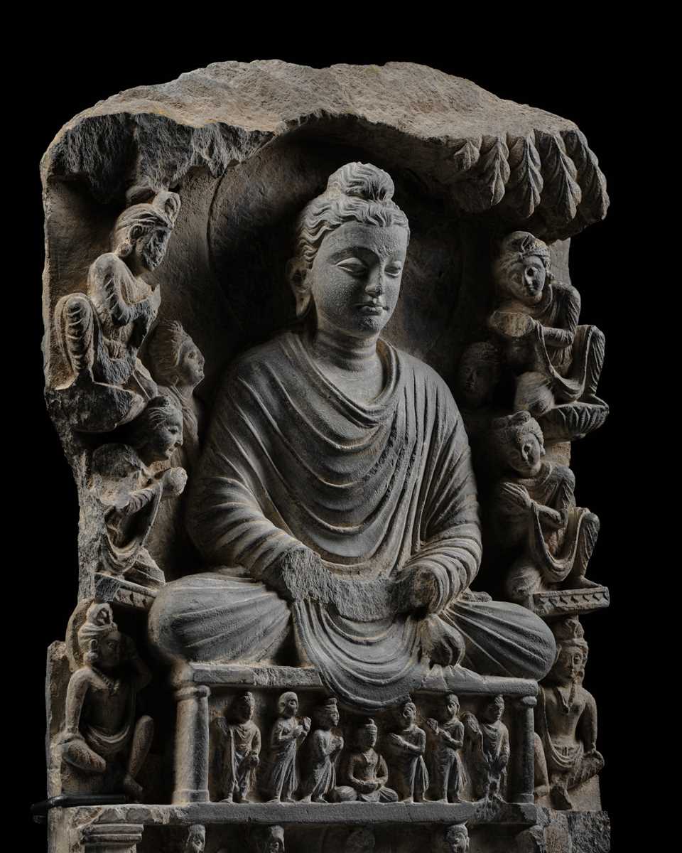 Lot 189 - A GRAY SCHIST RELIEF OF BUDDHA SHAKYAMUNI,
