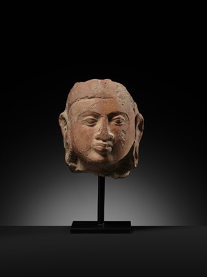 Lot 282 - A JAMMU TERRACOTTA HEAD OF A FEMALE DEITY, 6TH-7TH CENTURY