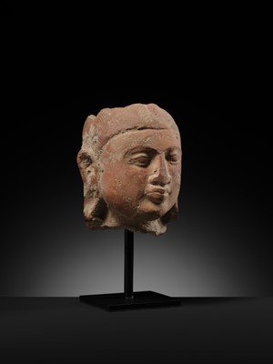 Lot 282 - A JAMMU TERRACOTTA HEAD OF A FEMALE DEITY, 6TH-7TH CENTURY