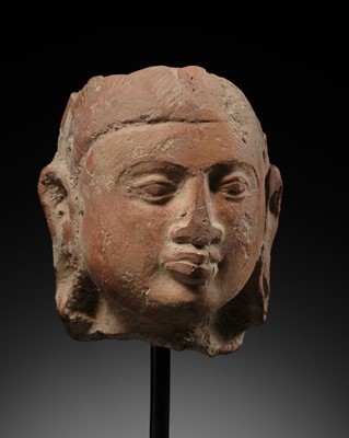 Lot 282 - A JAMMU TERRACOTTA HEAD OF A FEMALE DEITY, 6TH-7TH CENTURY
