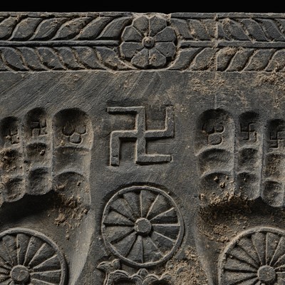Lot 186 - A RARE GRAY SCHIST RELIEF OF THE FOOTPRINTS OF BUDDHA, BUDDHAPADA, ANCIENT REGION OF GANDHARA