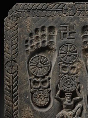 Lot 186 - A RARE GRAY SCHIST RELIEF OF THE FOOTPRINTS OF BUDDHA, BUDDHAPADA, ANCIENT REGION OF GANDHARA
