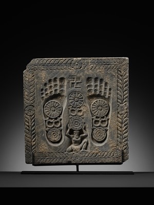Lot 186 - A RARE GRAY SCHIST RELIEF OF THE FOOTPRINTS OF BUDDHA, BUDDHAPADA, ANCIENT REGION OF GANDHARA