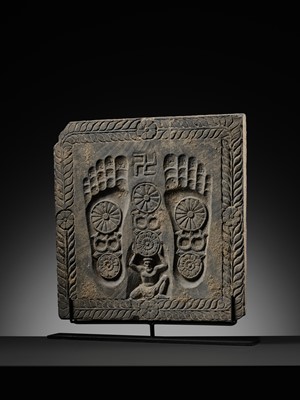 Lot 186 - A RARE GRAY SCHIST RELIEF OF THE FOOTPRINTS OF BUDDHA, BUDDHAPADA, ANCIENT REGION OF GANDHARA