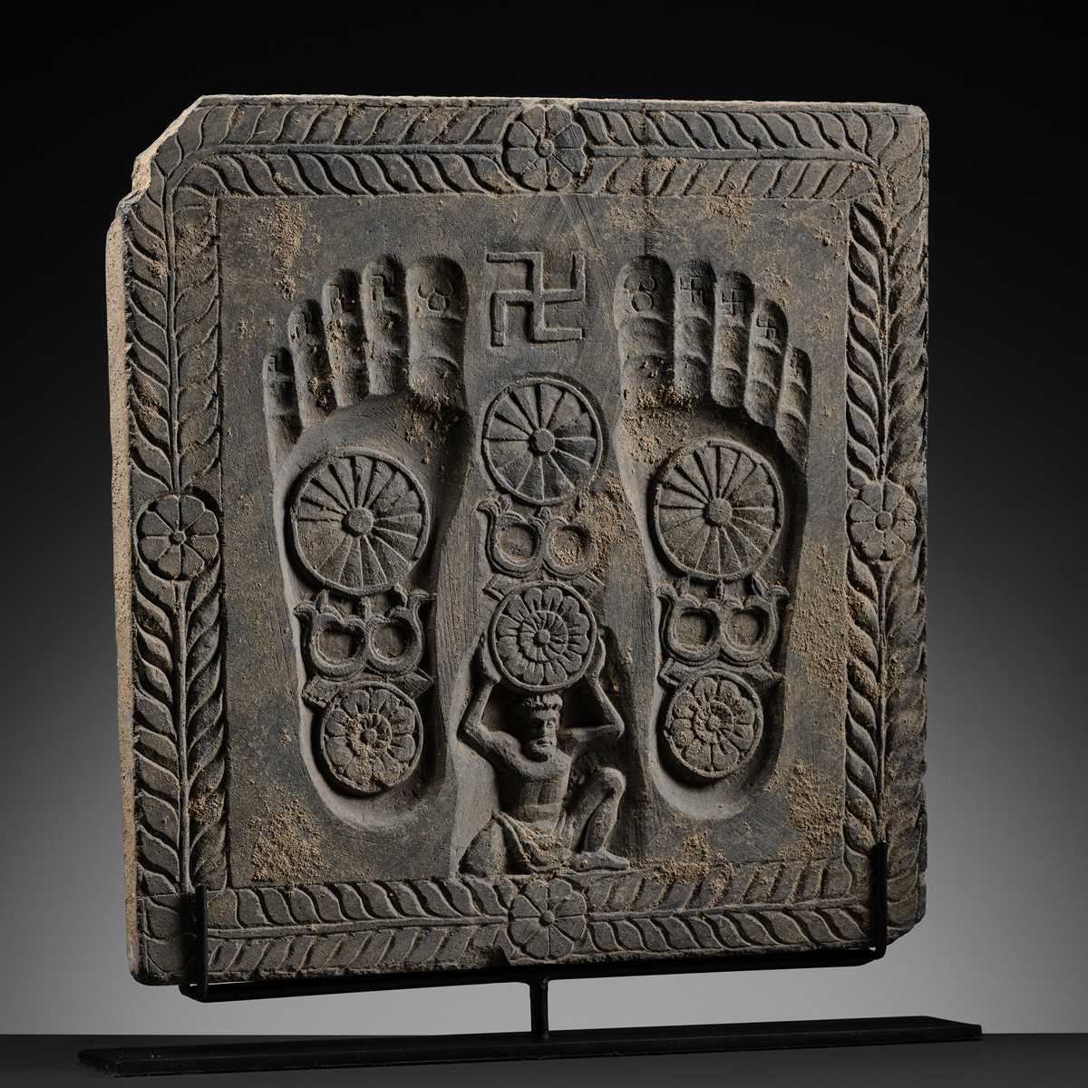 Lot 186 - A RARE GRAY SCHIST RELIEF OF THE FOOTPRINTS OF BUDDHA, BUDDHAPADA, ANCIENT REGION OF GANDHARA