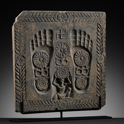 Lot 186 - A RARE GRAY SCHIST RELIEF OF THE FOOTPRINTS OF BUDDHA, BUDDHAPADA, ANCIENT REGION OF GANDHARA