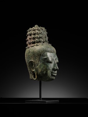Lot 237 - A BRONZE HEAD OF MAITREYA, PRE-ANGKORIAN PERIOD, PRAKHON CHAI, 7TH-9TH CENTURY