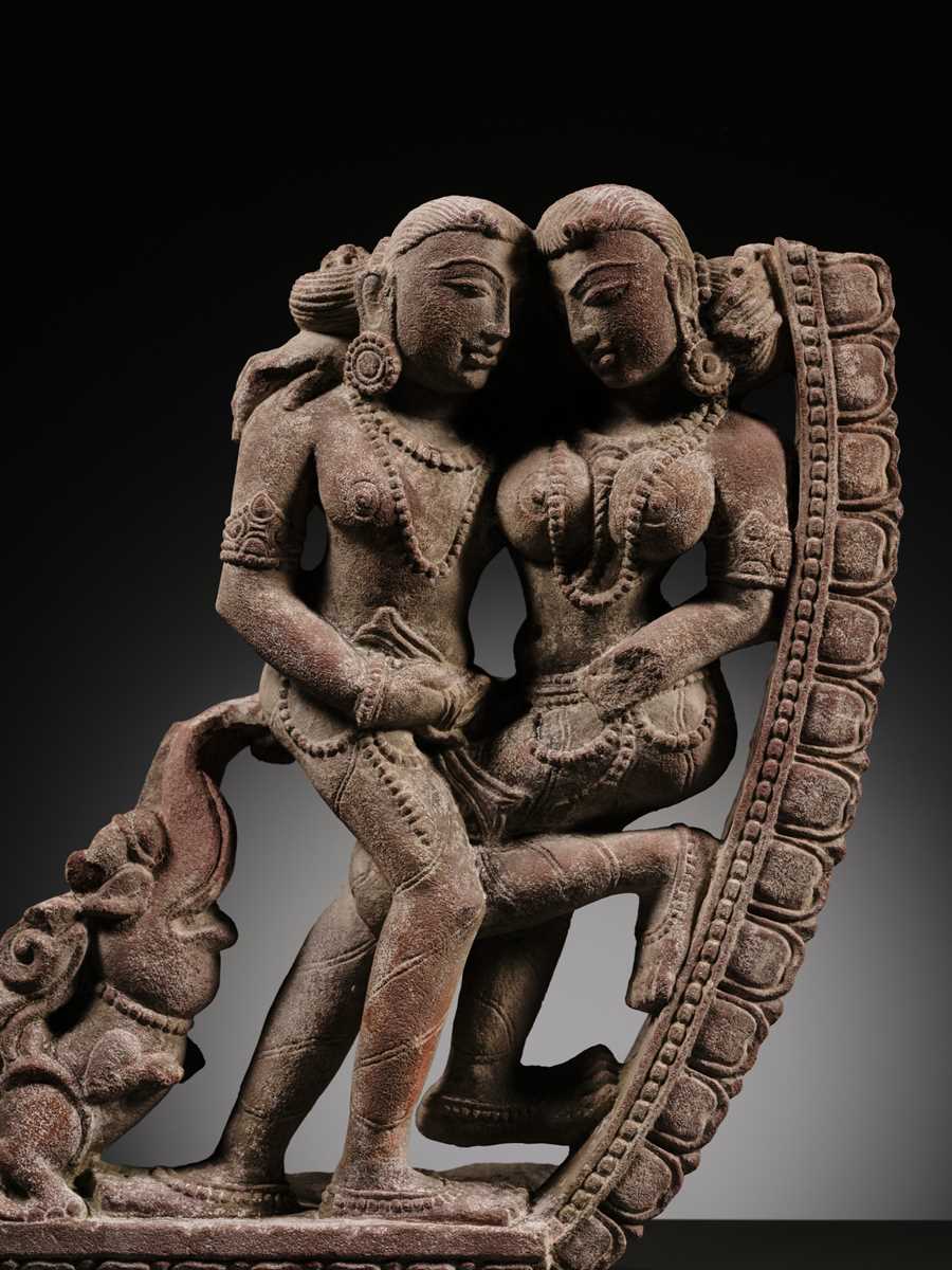A PINK SANDSTONE RELIEF DEPICTING AN AMOROUS COUPLE, MITHUNA, CHANDELA PERIOD, 10TH-11TH CENTURY