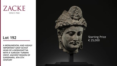 Lot 192 - A MONUMENTAL AND HIGHLY IMPORTANT GRAY SCHIST HEAD OF A BODHISATTVA WITH A ‘GARUDA’ TURBAN CREST, ANCIENT REGION OF GANDHARA, 4TH-5TH CENTURY