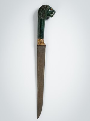 Lot 1271 - A SERPENTINE MUGHAL-STYLE ‘LION’ DAGGER, KHAJAR, c. 1900s