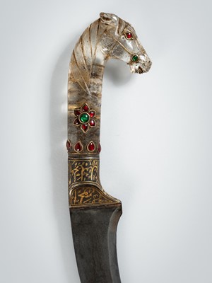 Lot 1274 - A MUGHAL-STYLE ROCK CRYSTAL ‘HORSE’ DAGGER, KHAJAR, c. 1900s