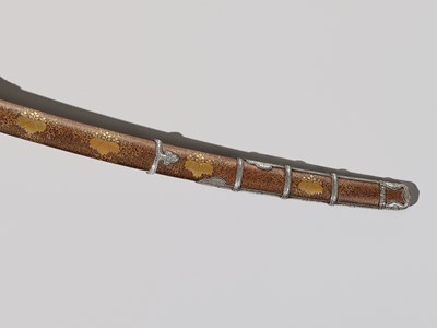 Lot 121 - A FINE SILVER-MOUNTED KOSHIRAE FOR A TACHI IN ITOMAKI