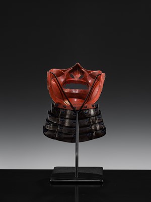 Lot 88 - A LACQUERED IRON ‘FANGED’ RESSEI MENPO