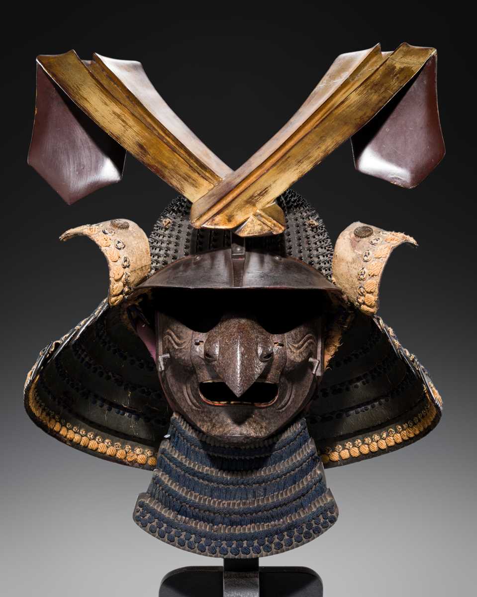 Lot 89 - MYOCHIN NOBUYOSHI: AN IRON KOBOSHI KABUTO AND TENGU MENPO