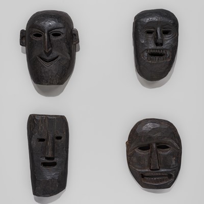 Lot 232 - A LOT WITH FOUR CARVED WOOD SHAMAN MASKS, MIDDLE HILLS, NEPAL, 19TH CENTURY