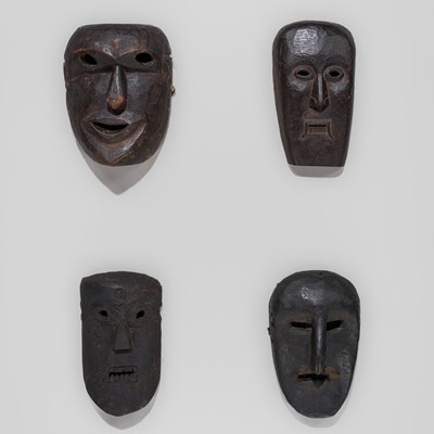 Lot 234 - A LOT WITH FOUR CARVED WOOD SHAMAN MASKS, MIDDLE HILLS, NEPAL, 19TH CENTURY