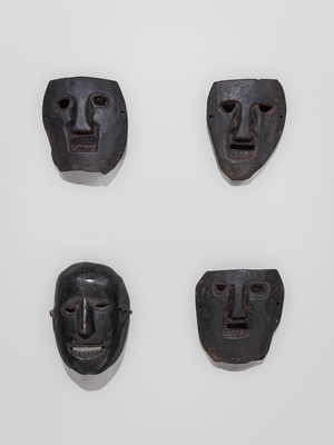 Lot 235 - A LOT WITH FOUR CARVED WOOD SHAMAN MASKS, MIDDLE HILLS, NEPAL, 19TH CENTURY
