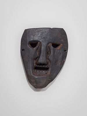 Lot 235 - A LOT WITH FOUR CARVED WOOD SHAMAN MASKS, MIDDLE HILLS, NEPAL, 19TH CENTURY