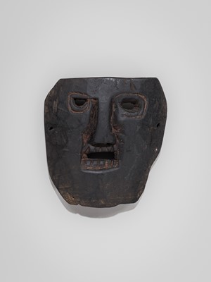Lot 235 - A LOT WITH FOUR CARVED WOOD SHAMAN MASKS, MIDDLE HILLS, NEPAL, 19TH CENTURY