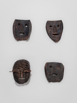 Lot 235 - A LOT WITH FOUR CARVED WOOD SHAMAN MASKS, MIDDLE HILLS, NEPAL, 19TH CENTURY