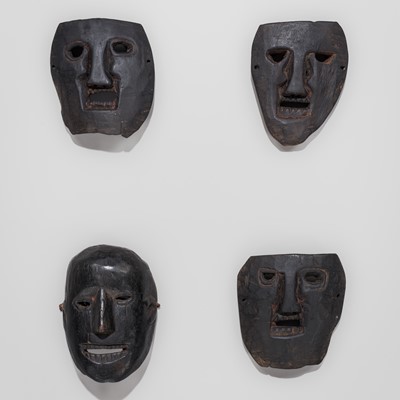 Lot 235 - A LOT WITH FOUR CARVED WOOD SHAMAN MASKS, MIDDLE HILLS, NEPAL, 19TH CENTURY