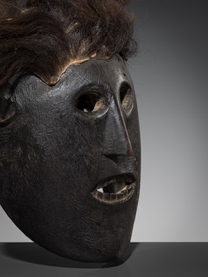 Lot 230 - A FINE WOOD SHAMAN MASK WITH HAIR, MIDDLE HILLS, NEPAL, 18TH-19TH CENTURY
