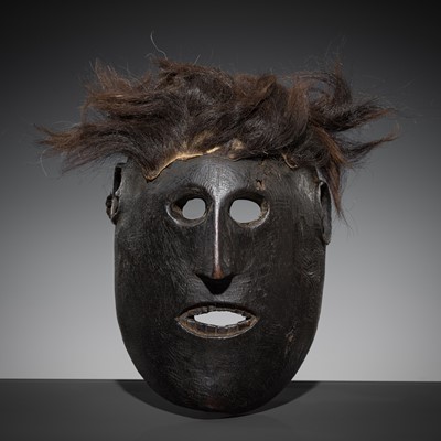 Lot 230 - A FINE WOOD SHAMAN MASK WITH HAIR, MIDDLE HILLS, NEPAL, 18TH-19TH CENTURY