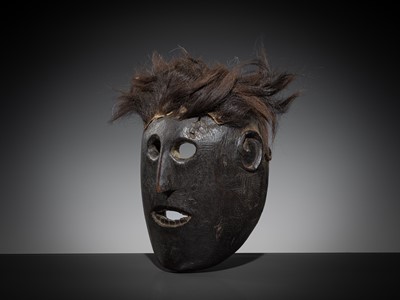 Lot 230 - A FINE WOOD SHAMAN MASK WITH HAIR, MIDDLE HILLS, NEPAL, 18TH-19TH CENTURY