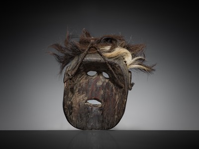 Lot 230 - A FINE WOOD SHAMAN MASK WITH HAIR, MIDDLE HILLS, NEPAL, 18TH-19TH CENTURY