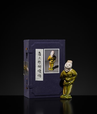 Lot 1078 - A SMALL SANCAI-GLAZED POTTERY FIGURE OF A FOREIGNER, TANG DYNASTY