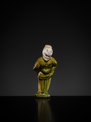 Lot 1078 - A SMALL SANCAI-GLAZED POTTERY FIGURE OF A FOREIGNER, TANG DYNASTY