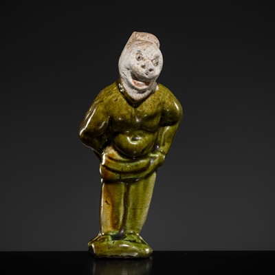 Lot 1078 - A SMALL SANCAI-GLAZED POTTERY FIGURE OF A FOREIGNER, TANG DYNASTY