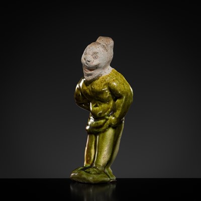 Lot 1078 - A SMALL SANCAI-GLAZED POTTERY FIGURE OF A FOREIGNER, TANG DYNASTY