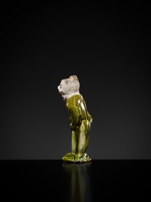 Lot 1078 - A SMALL SANCAI-GLAZED POTTERY FIGURE OF A FOREIGNER, TANG DYNASTY