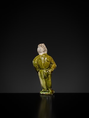 Lot 1078 - A SMALL SANCAI-GLAZED POTTERY FIGURE OF A FOREIGNER, TANG DYNASTY