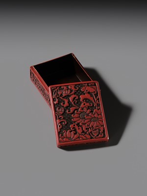 A CINNABAR LACQUER ‘CHRYSANTHEMUM’ BOX AND COVER, QING DYNASTY