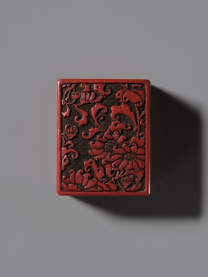 A CINNABAR LACQUER ‘CHRYSANTHEMUM’ BOX AND COVER, QING DYNASTY
