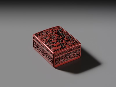 A CINNABAR LACQUER ‘CHRYSANTHEMUM’ BOX AND COVER, QING DYNASTY