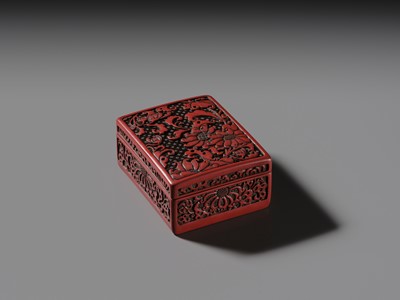 A CINNABAR LACQUER ‘CHRYSANTHEMUM’ BOX AND COVER, QING DYNASTY