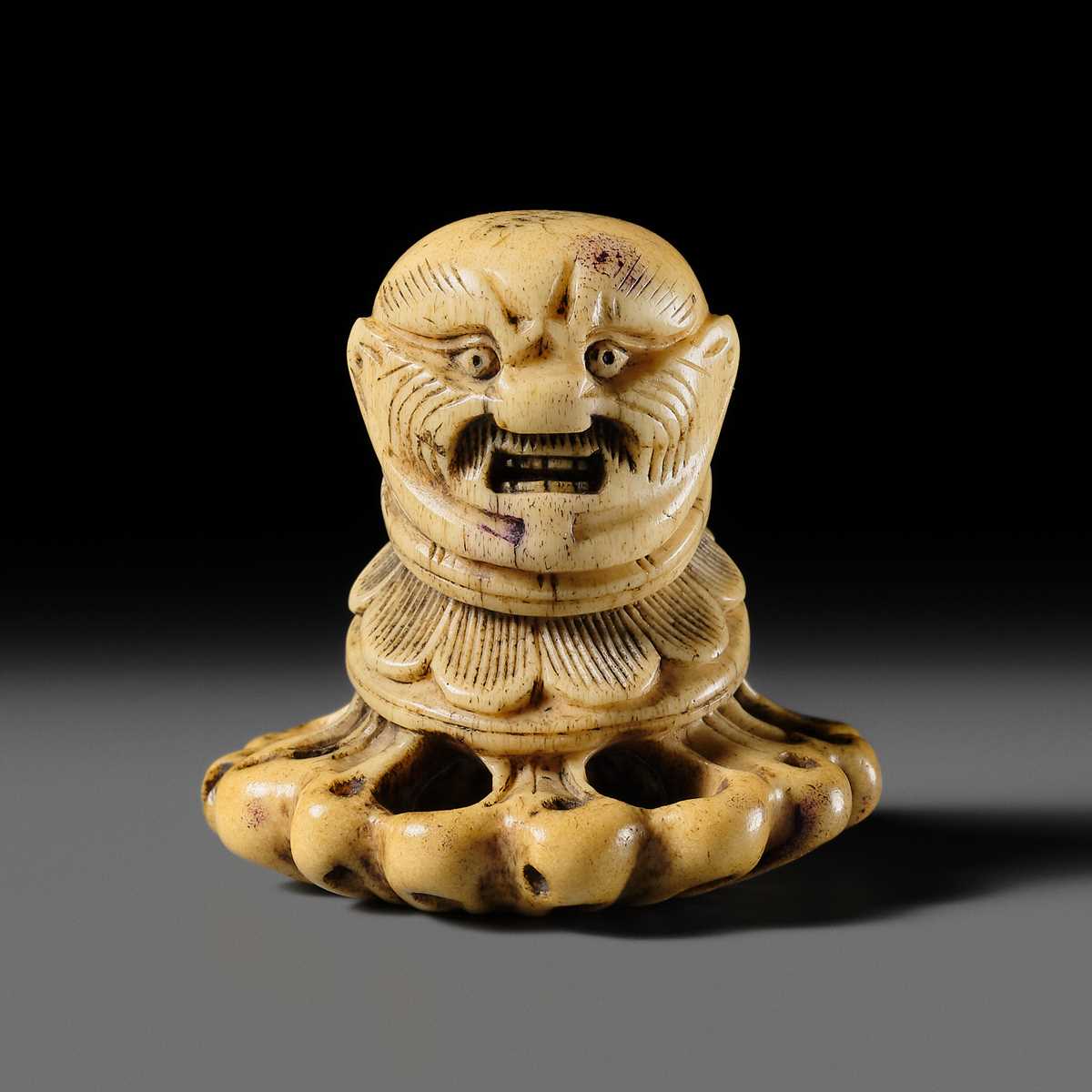 Lot 312 - A RARE ANTLER ‘SILK SEAL’ TYPE NETSUKE OF A