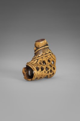 Lot 459 - A FINE ANTLER ‘SILK SEAL’ NETSUKE OF A FOREIGNER