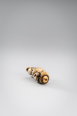 Lot 463 - A FINE AND EARLY ANTLER NETSUKE OF A NIO GUARDIAN