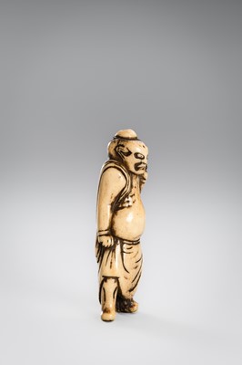 Lot 463 - A FINE AND EARLY ANTLER NETSUKE OF A NIO GUARDIAN
