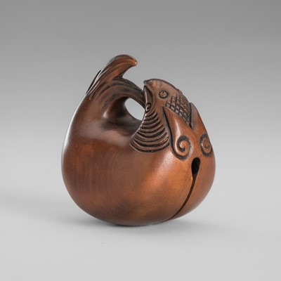 Lot 456 - GYOKUMIN: A LARGE WOOD NETSUKE OF A MOKUGYO TEMPLE BELL
