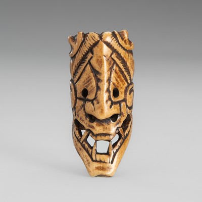 Lot 462 - AN ANTLER MASK NETSUKE OF HANNYA
