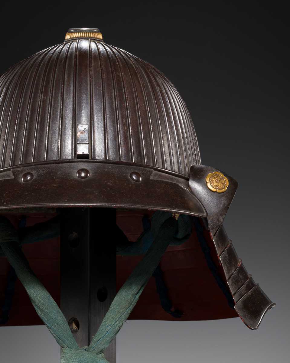 Lot 96 - A HARUTA SCHOOL IRON SUJIBACHI KABUTO WITH ODA CLAN MON