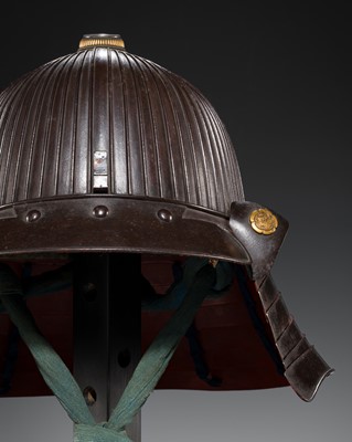 Lot 96 - A HARUTA SCHOOL IRON SUJIBACHI KABUTO WITH ODA CLAN MON