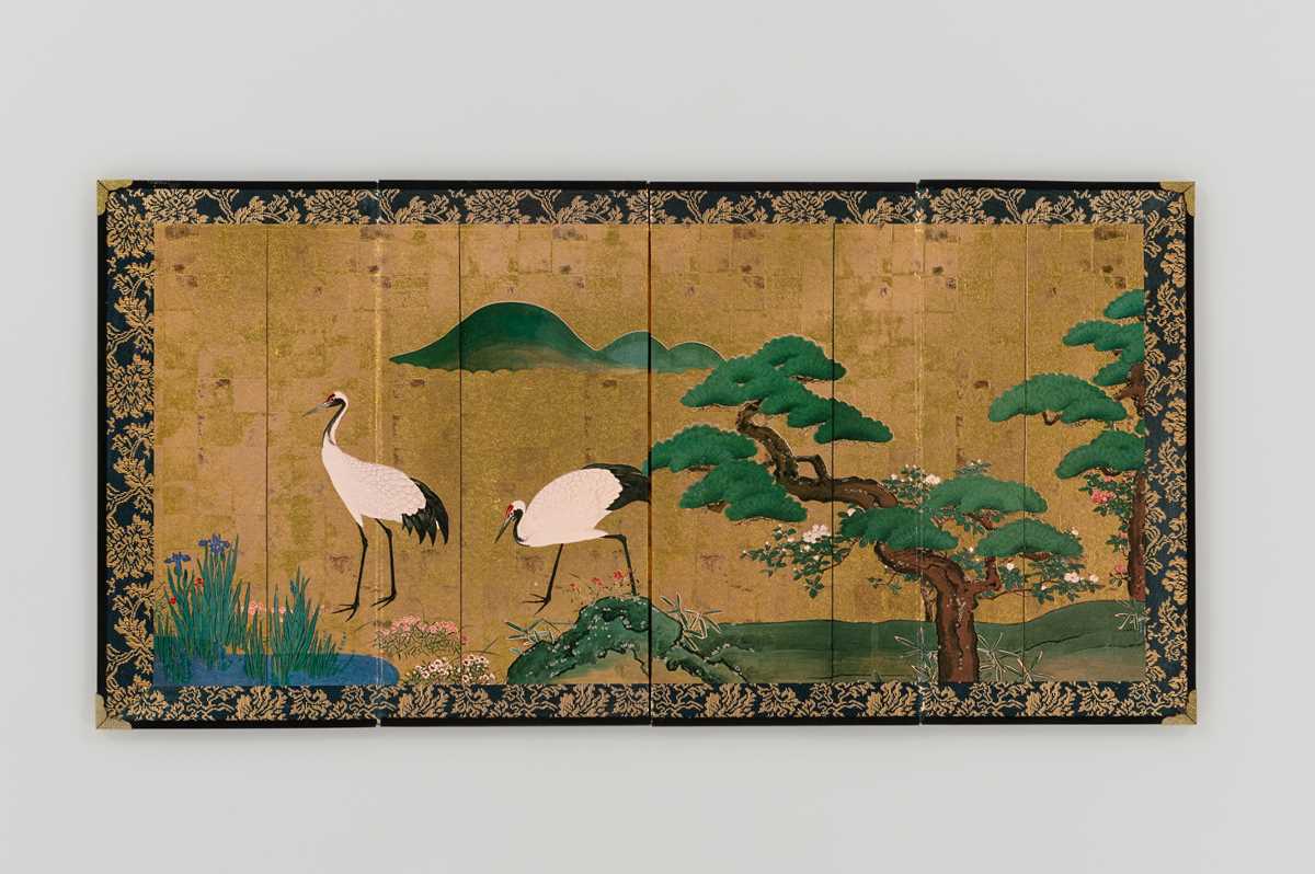 Lot 594 - A FOUR-PANEL PRINTED BYOBU (FOLDING SCREEN) DEPICTING CRANES