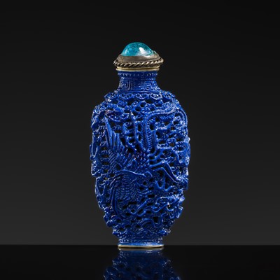 Lot 490 - A SAPPHIRE-BLUE GLAZED PORCELAIN ‘DRAGON AND PHOENIX’ SNUFF BOTTLE, IMPERIAL KILNS JINGDEZHEN, 1796-1820