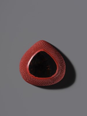 Lot 115 - A CINNABAR LACQUER PEACH-FORM BOX AND COVER DEPICTING SHOULAO, 18TH CENTURY